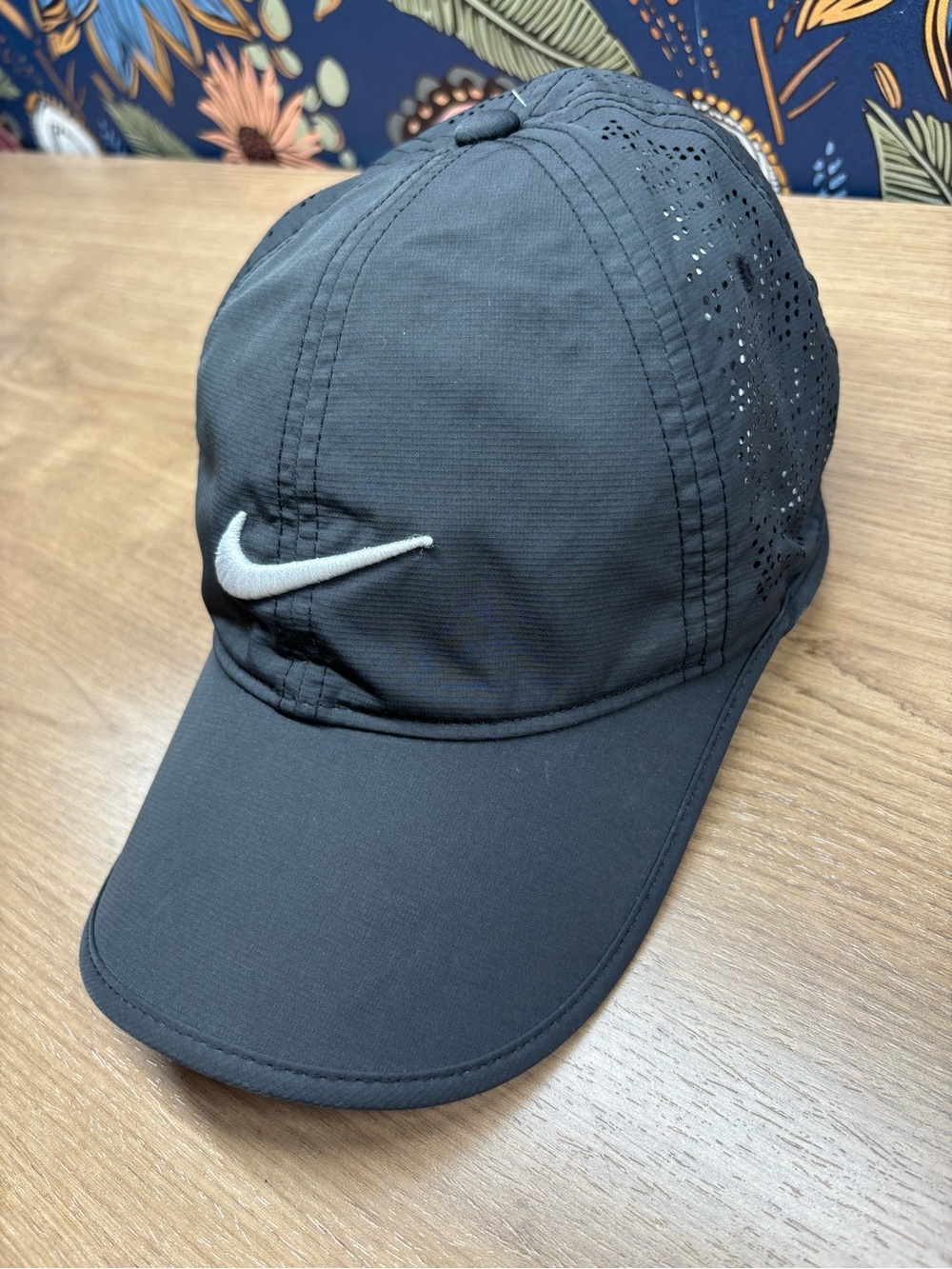 Nike Women's Perdorated Black Cap with White Swoosh